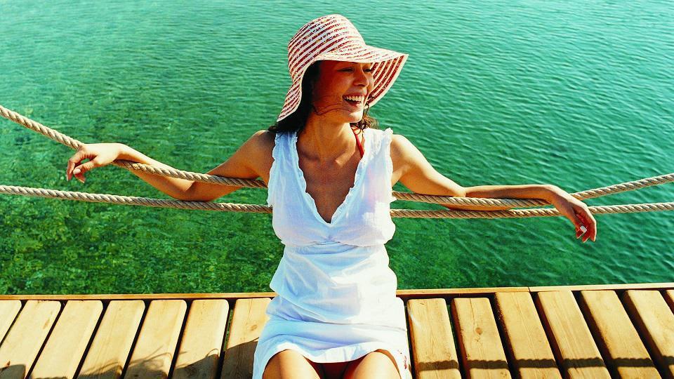 Hotel Su & Aqualand Antalya Exterior foto A woman wearing a sun hat
